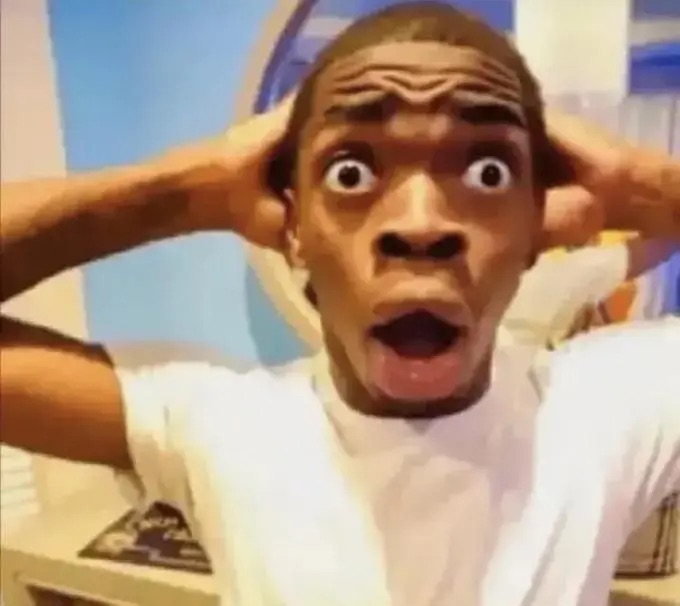 black guy who is suprised face meme img
